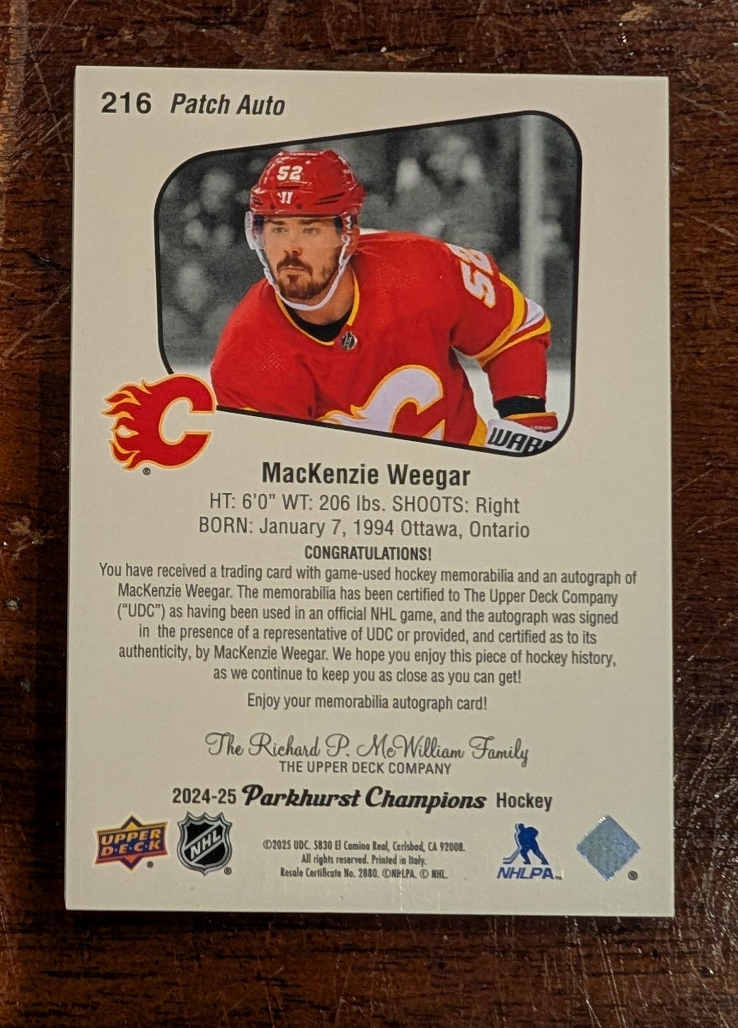 2024-25 Parkhurst Champions Patch Auto MacKenzie Weegar #216 /15 - Calgary Flames (Game-Used Patch + Autograph)