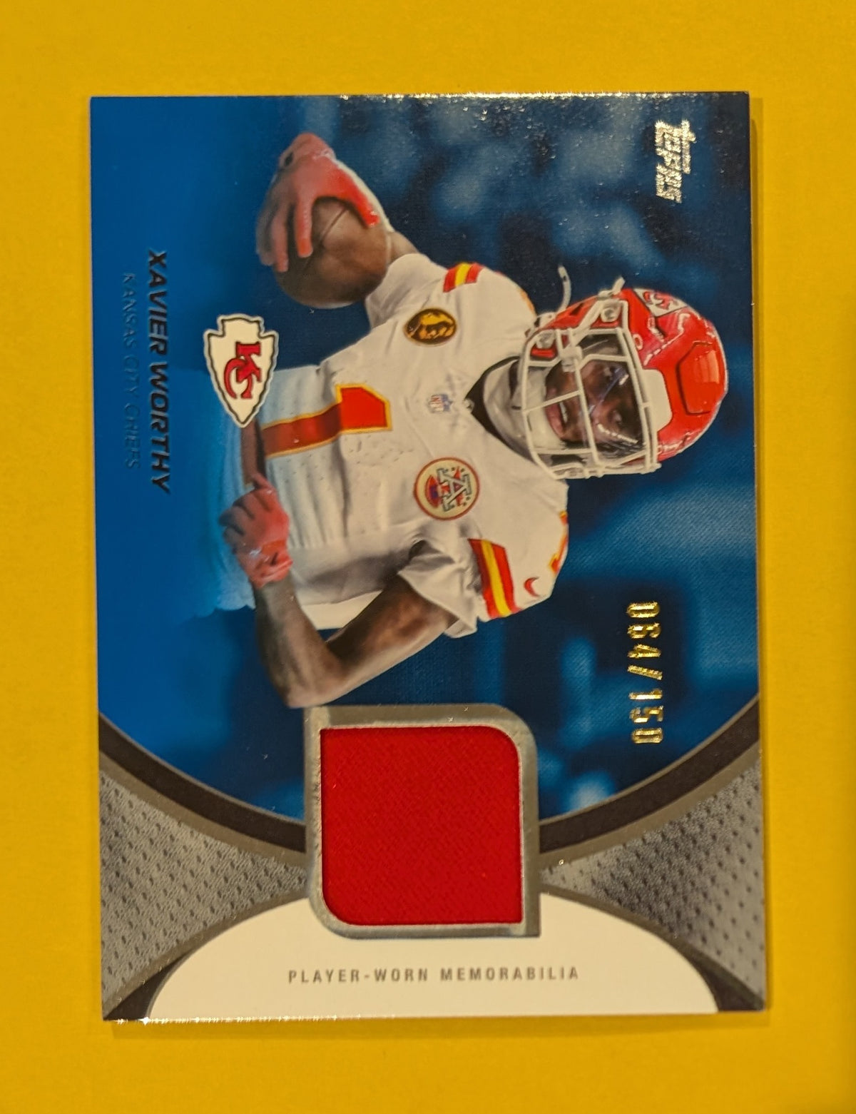 2026 Topps Football Xavier Worthy Chiefs NFL Material Relic Blue SP /150