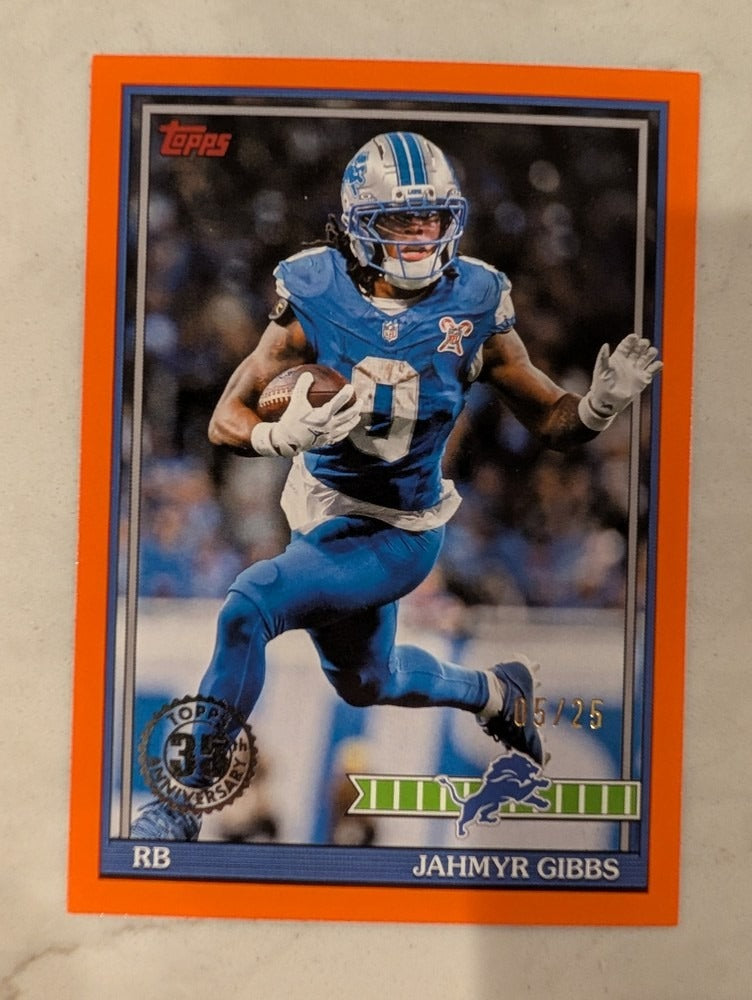 2026 Topps Football Jahmyr Gibbs Detroit Lions Orange Football SP /25 #70